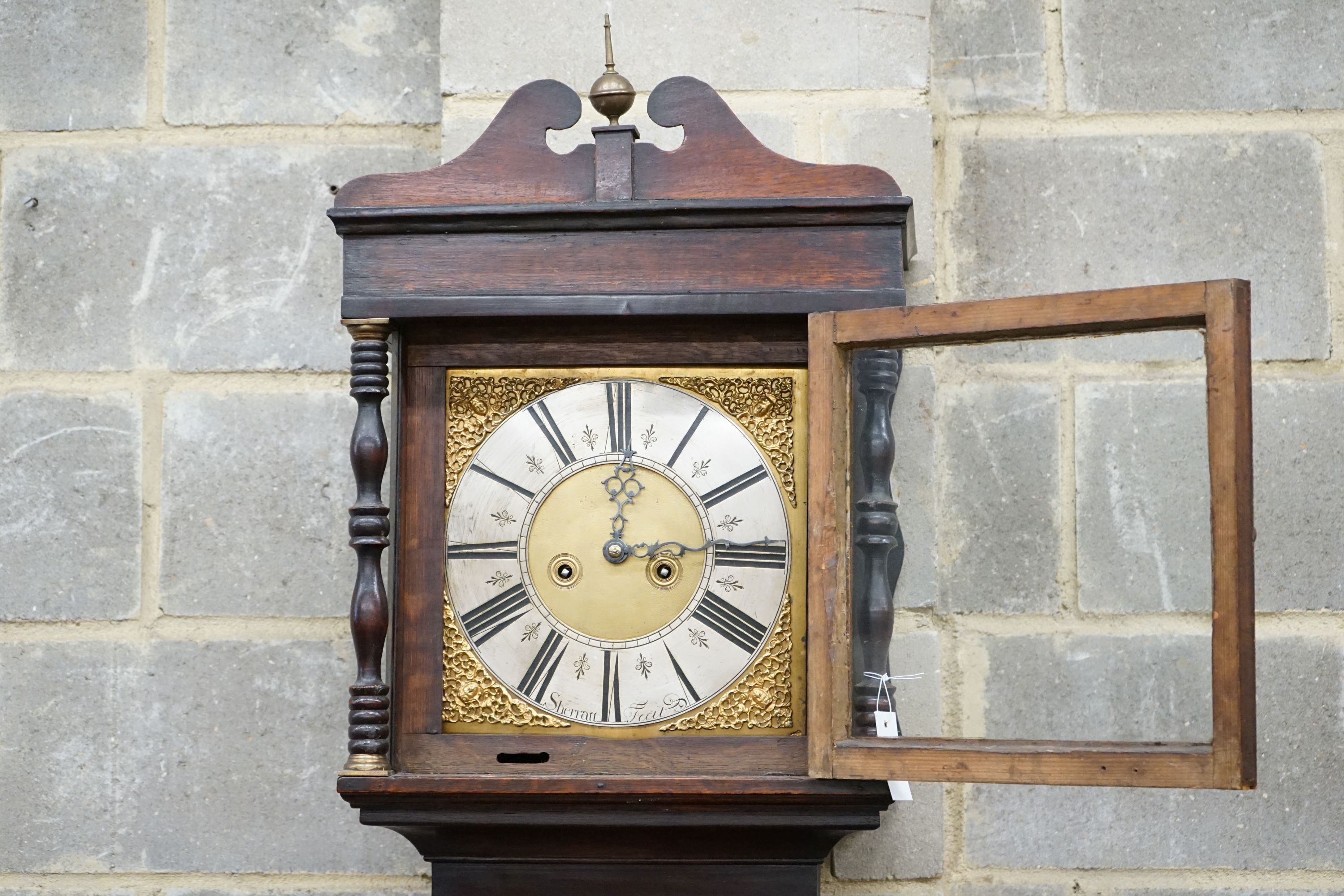 An 18th century oak eight day longcase clock, marked Sherratt, height 208cm